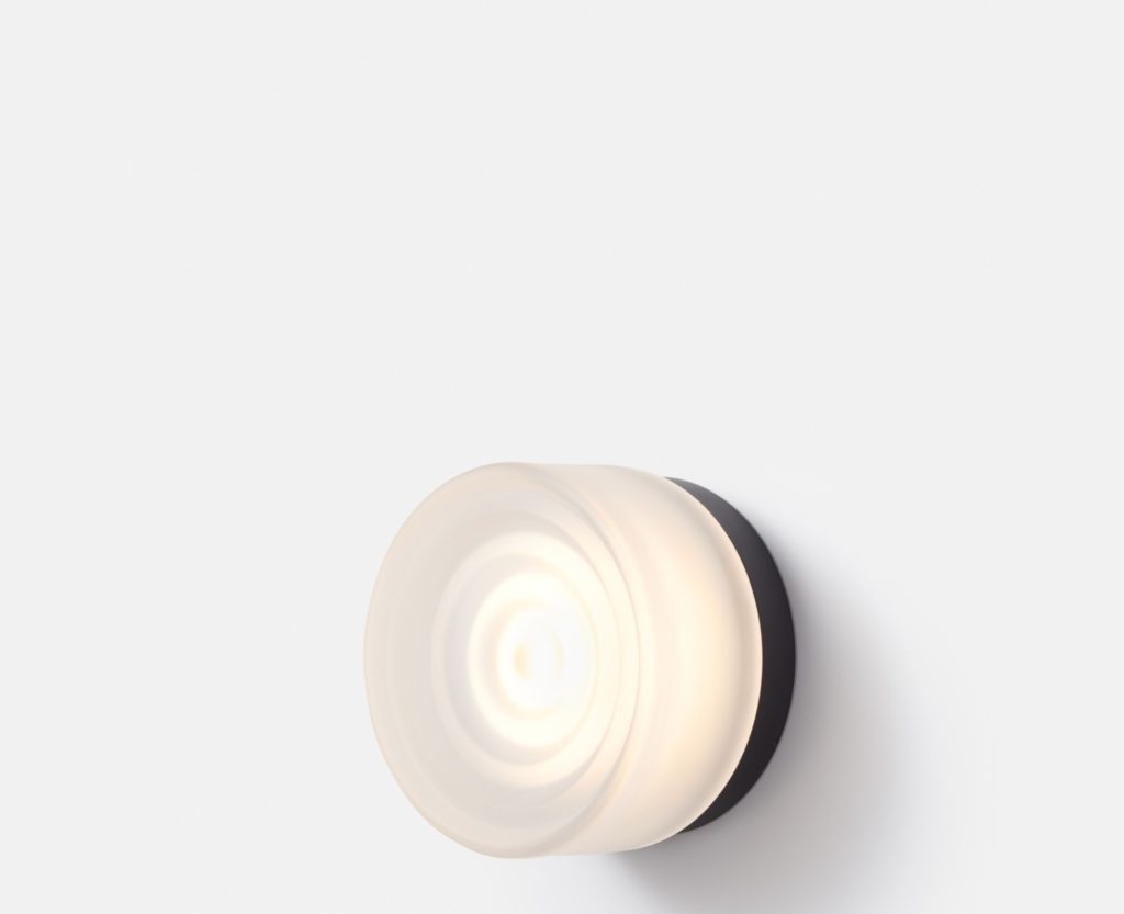 Ripple wall sconce frosted with black back plate