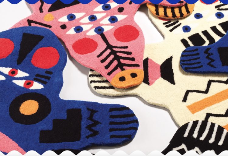 partial view of three monster carpets in blue, pink, and white