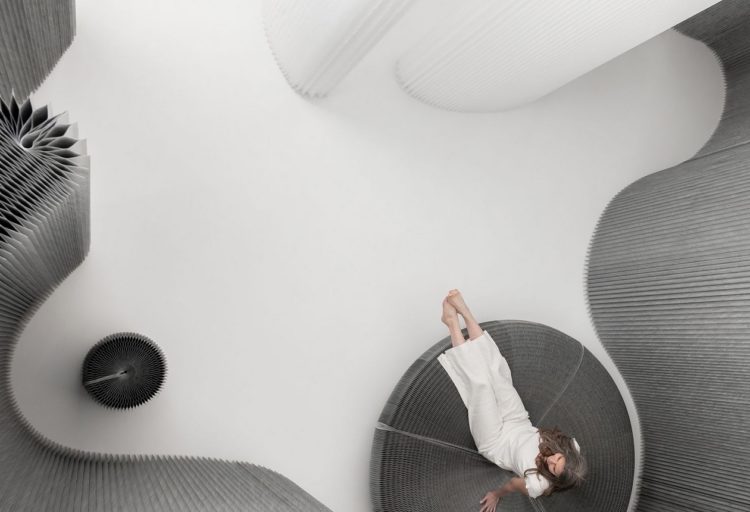 Aluminum Textile partition and bench with reclining woman, view from above
