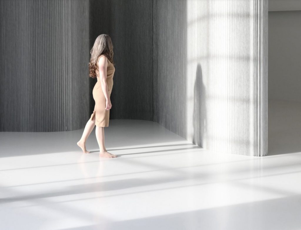Softwall display with barefoot woman