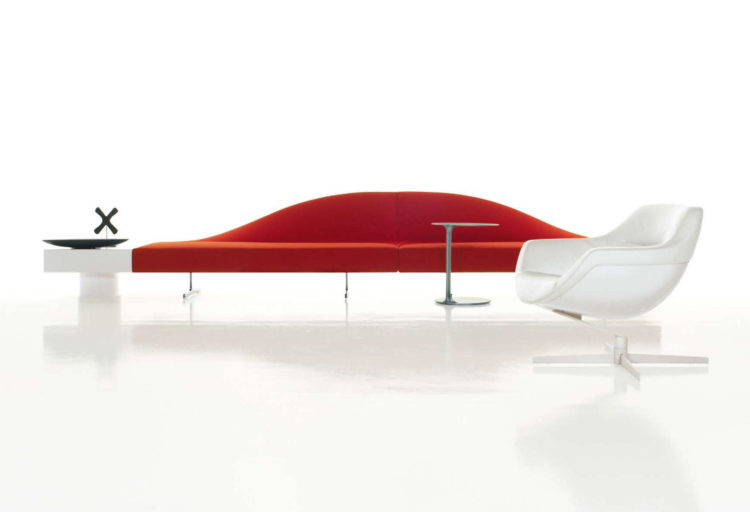 Aspen two in red from front with white chair and low tables