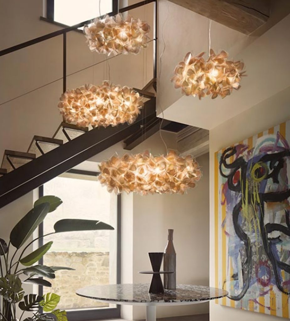 Clizia golden suspension lamps in vestibule