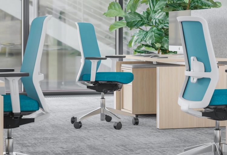 Surf chair in aqua color. Several chairs in office environment.
