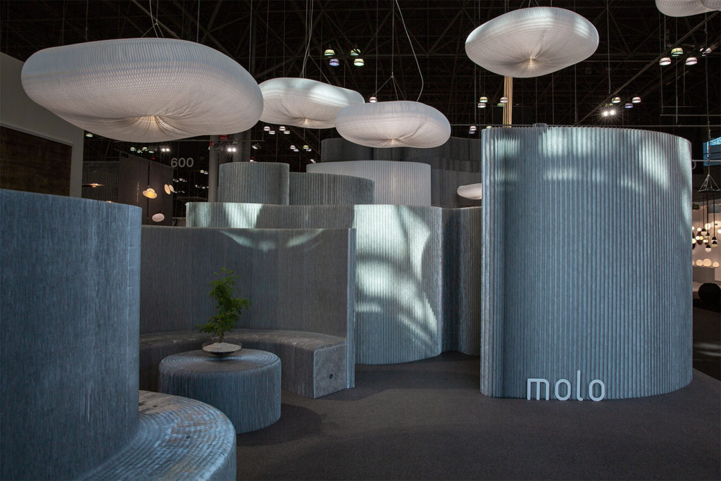 Molo Softwall in dim environment with privacy-style booths and cloud lights