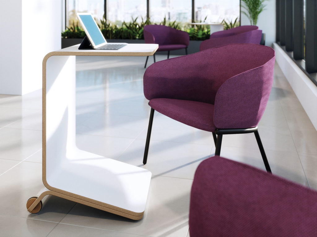 A white laptop table next to a maroon upholstered chair
