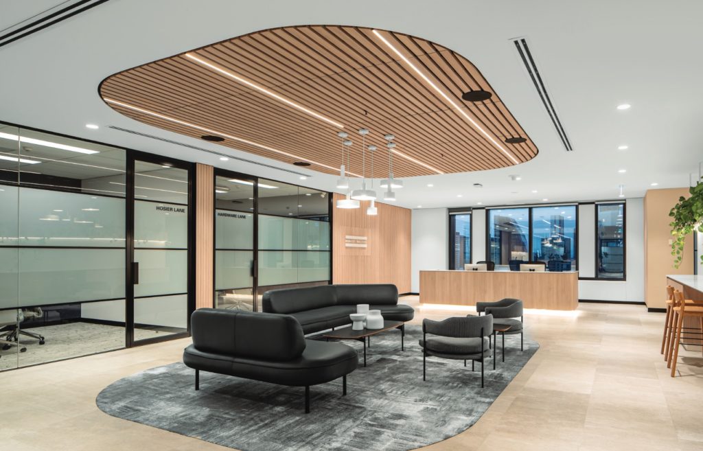 inset wood ceiling over collaboration space