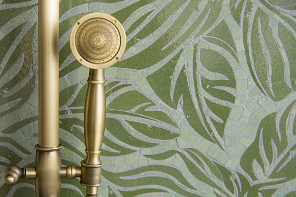 Canna mosaic design leaf pattern in dark green on palette of lighter green