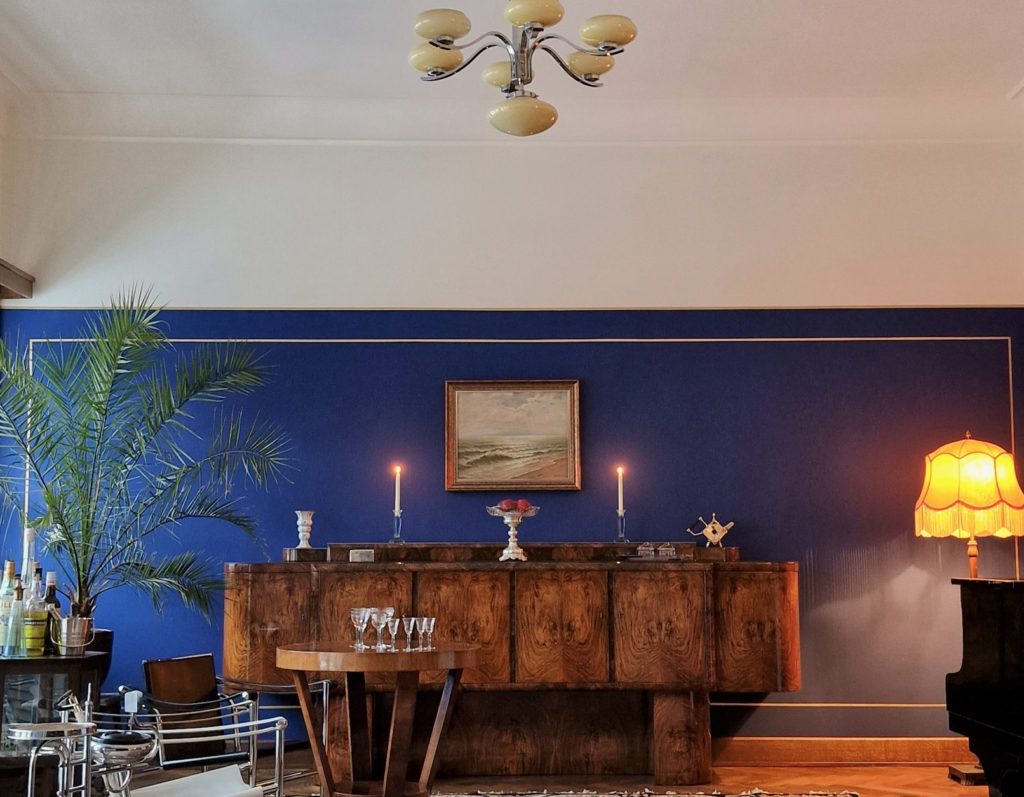 Living room with modern credenza and art deco lamp