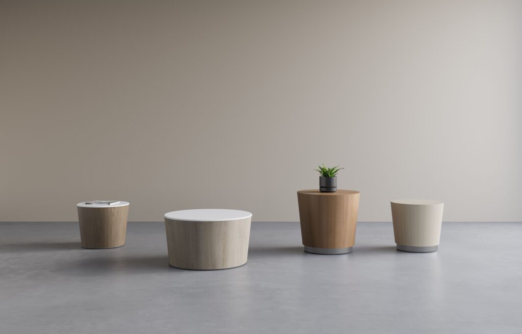 Four drum tables in different colors and sizes