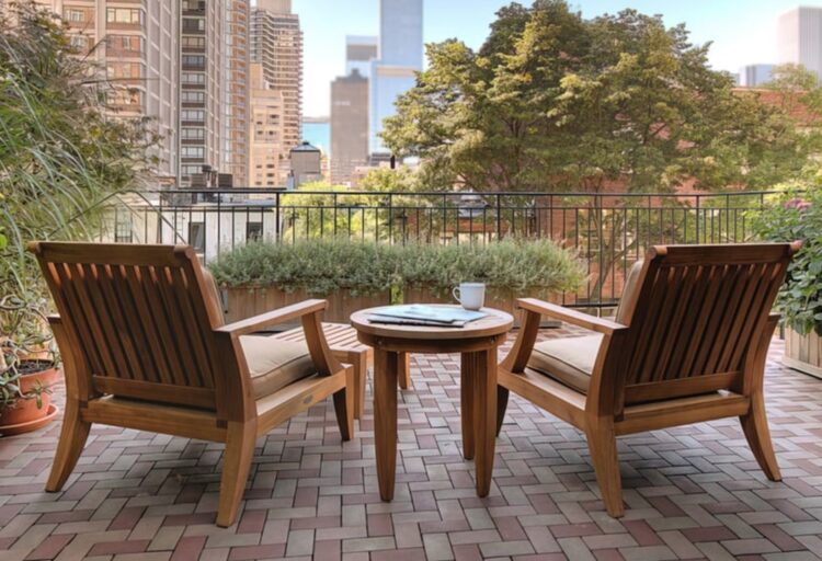 Aspire Pavers red and tawny pavers in-ground with chairs looking out on park