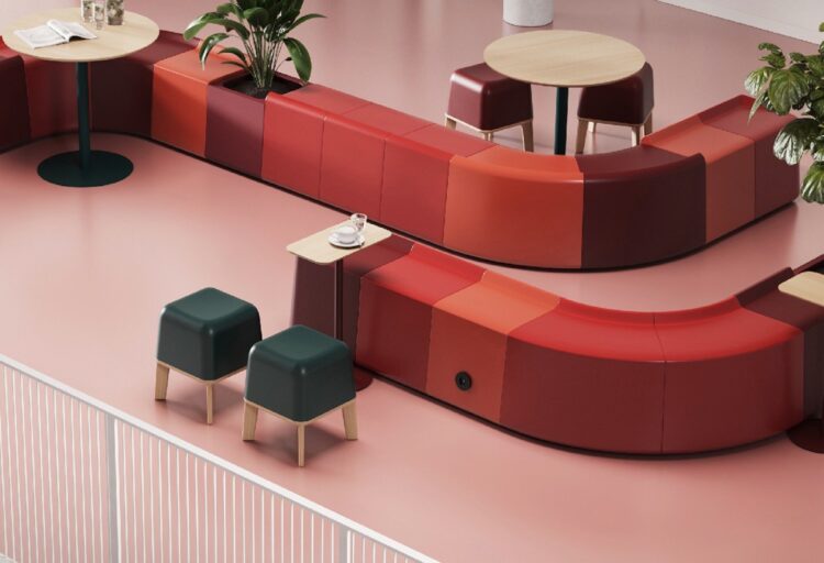 Colorful modular furniture in curvy configuration in workspace
