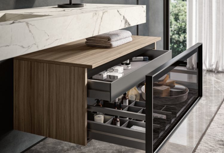 Class vanity in wood veneer with white top and open drawers
