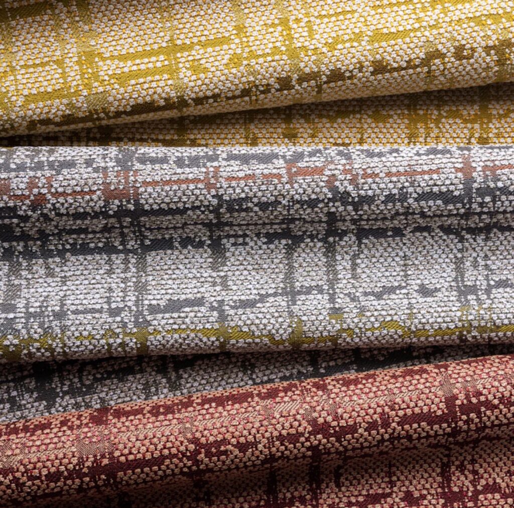 detail of Geoglyph textile in three different colors