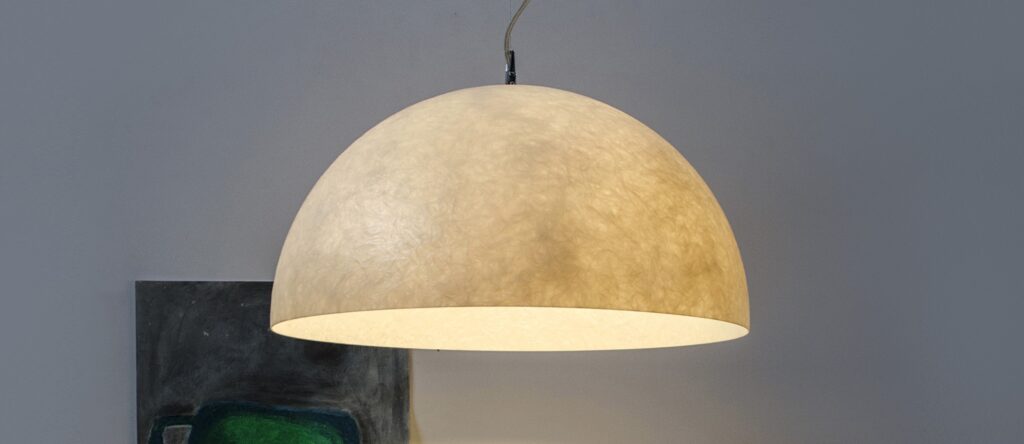 off-white hemispherical pendant light close view