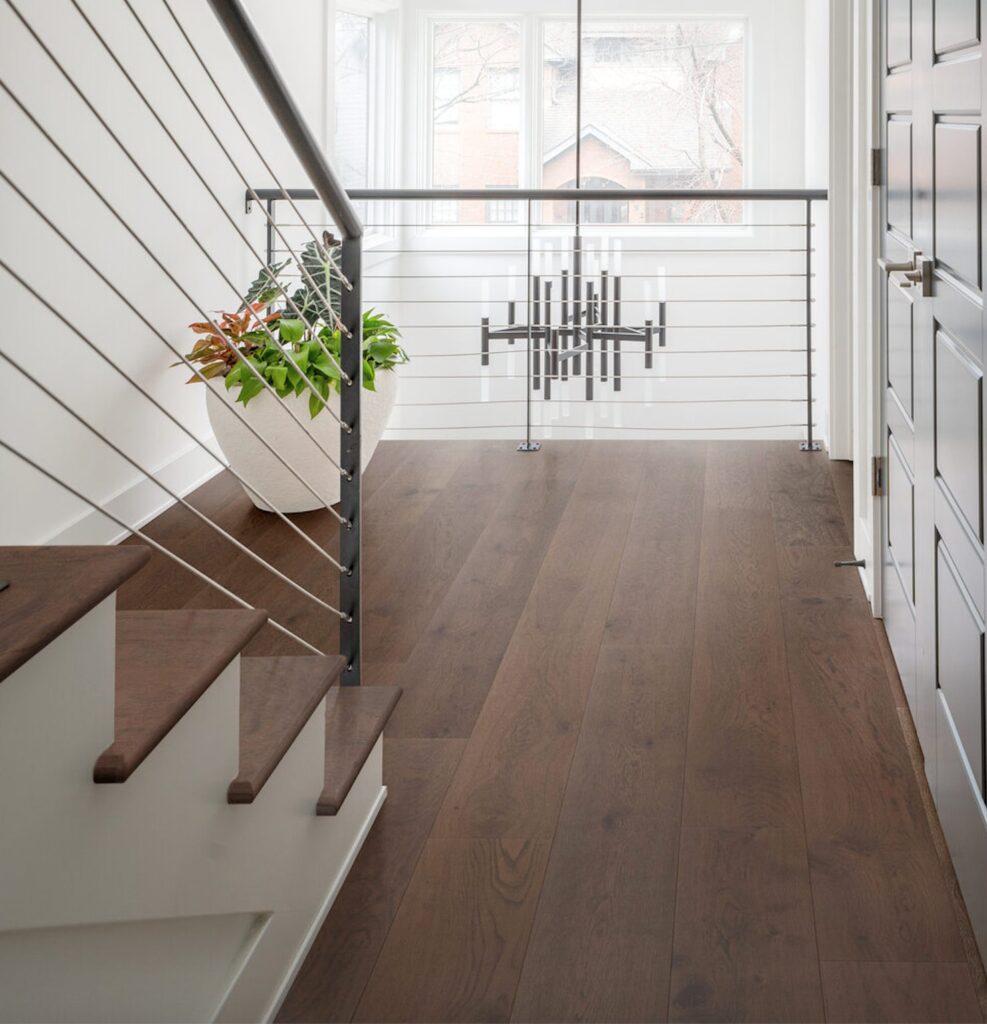 Bjelin flooring wide plank oak on second-floor stair landing