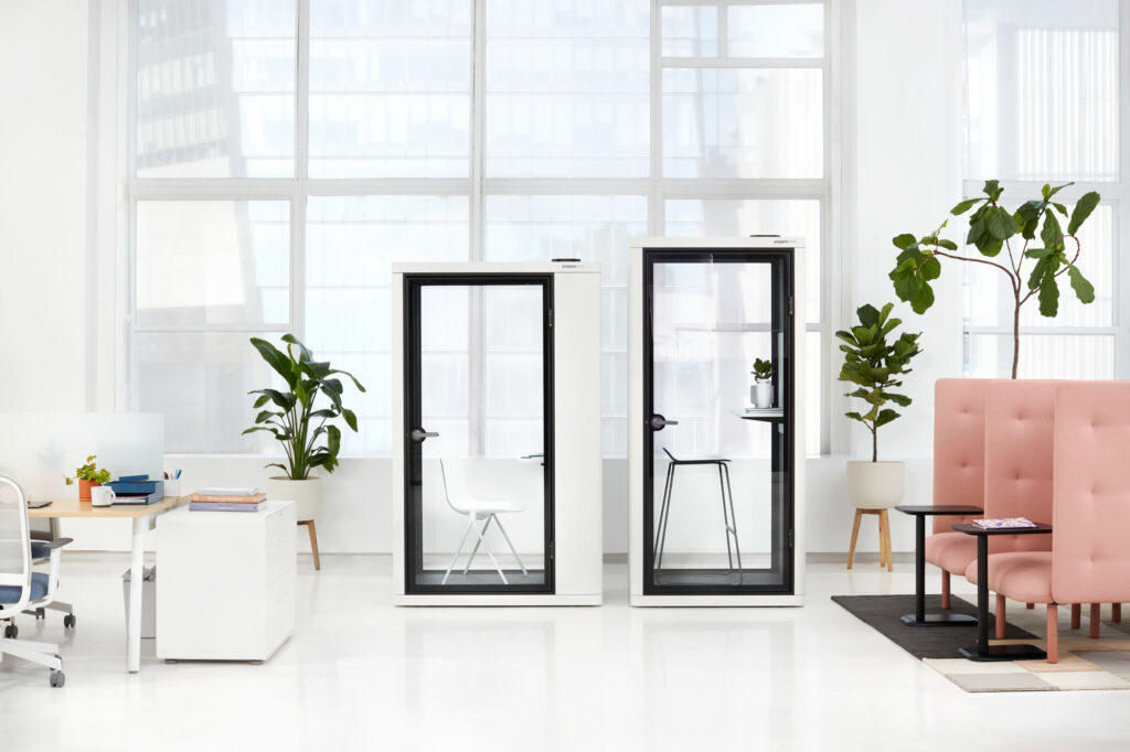 Om double pods one for sitting and one for standing, white trim, in open office