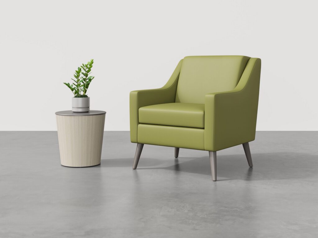 Pavilion table in light white next to green chair
