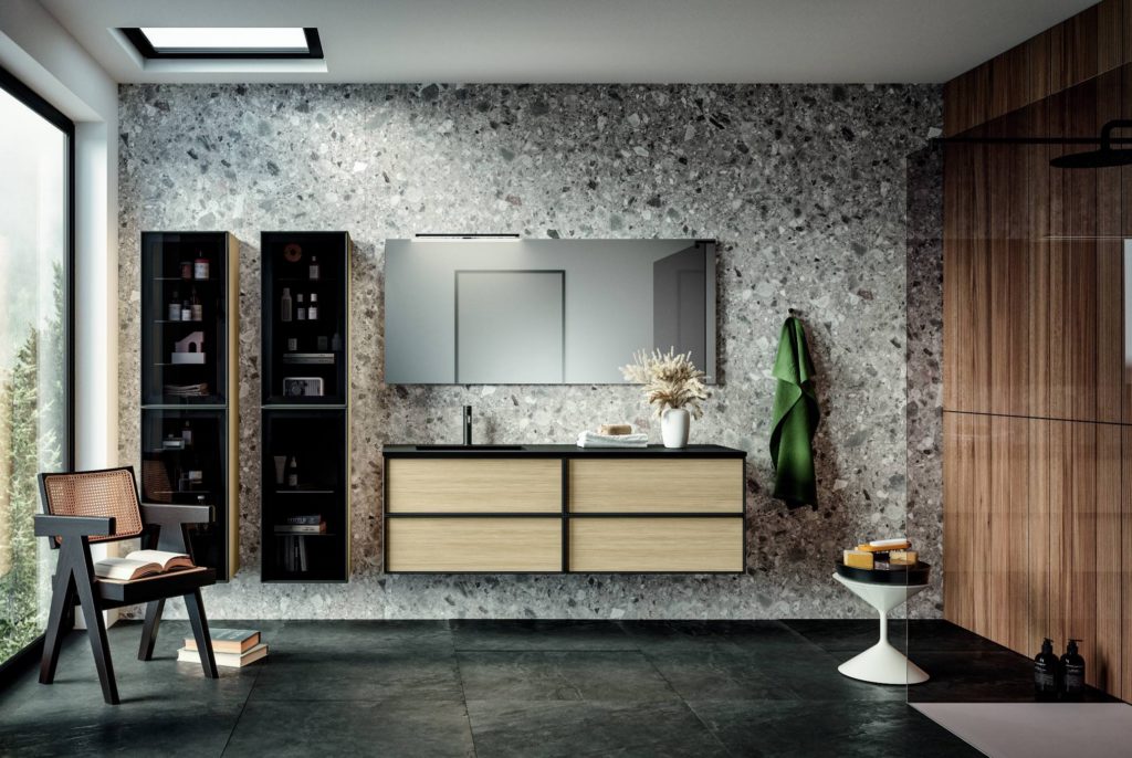 Vanity in stylish bathroom with wood veneer fronts and black frame
