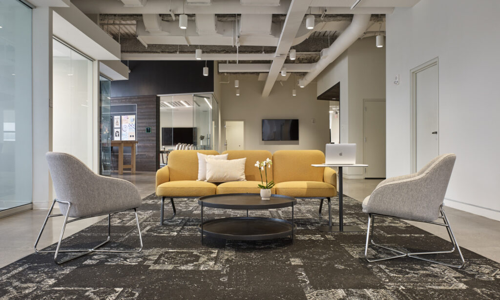 Lounge chairs with low back and tubular steel sled bases