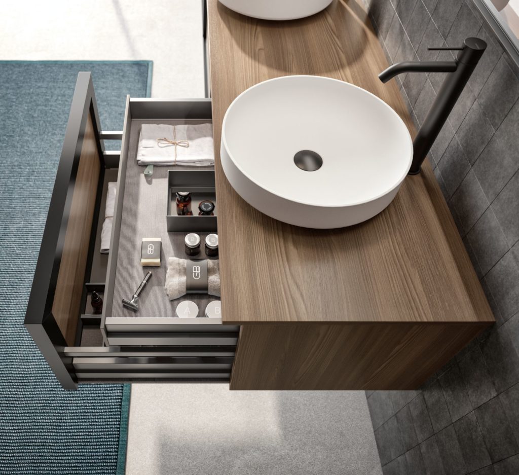 Class vanity view from above with drawers in open position.