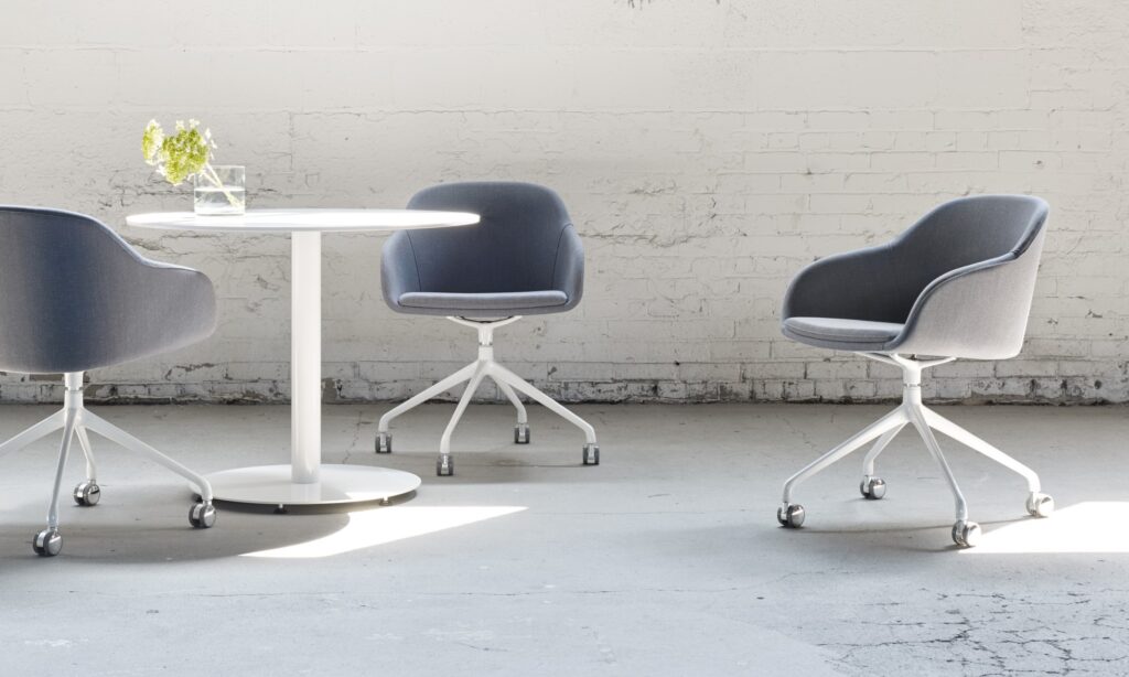Swivel chairs near cafe table