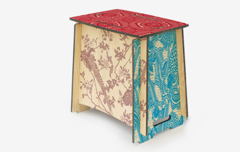 With colorful designs on seat and sides