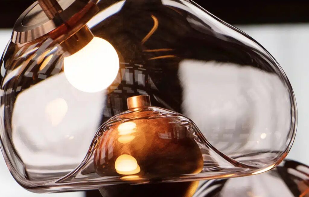 Blown glass shade detail with bulb visible
