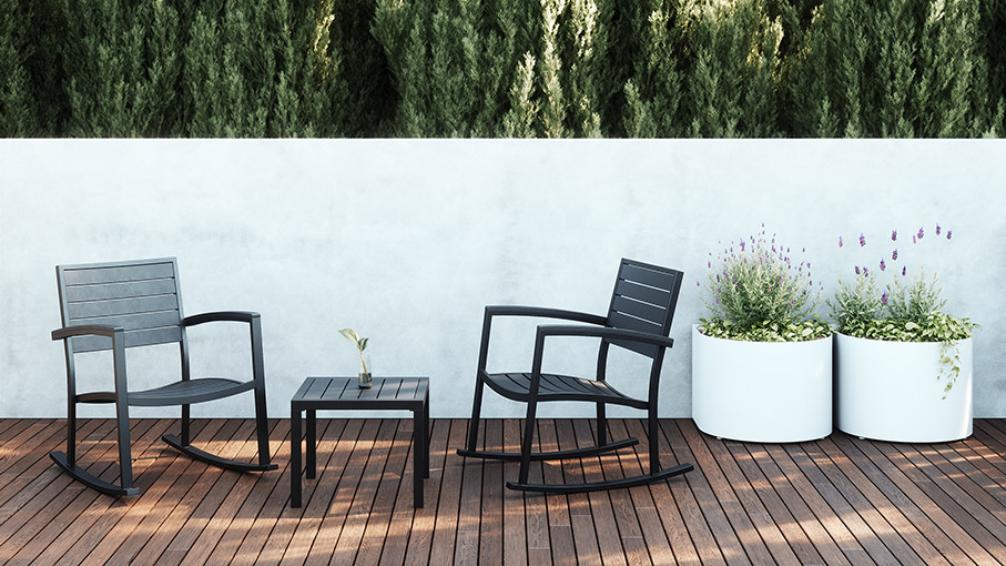 Eveleen rocking chairs and side table in solid black on wood patio