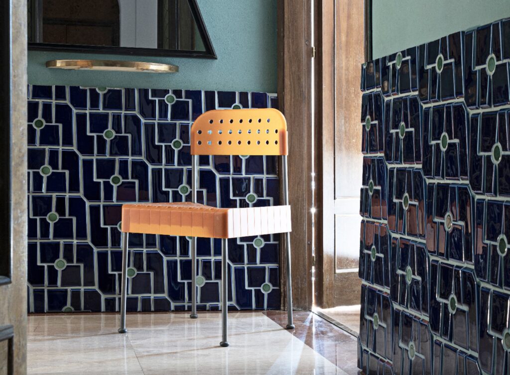 Ultrafine porcelain on walls in hallway with modern chair