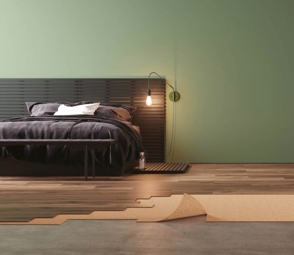 Room with unfinished flooring to depict Amorim Cork underlayment