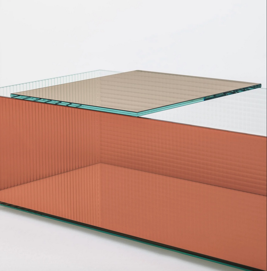 Table close view with smoky glass on top and orange glass on sides and bottom