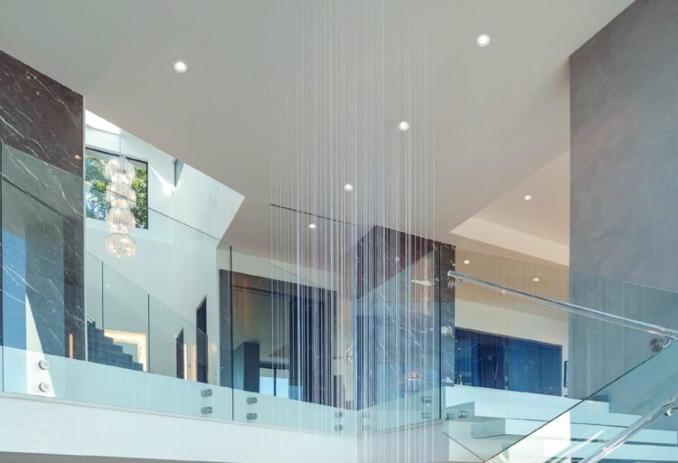 CSL Lighting Acrobat wall wash illuminating wall in expansive atrium