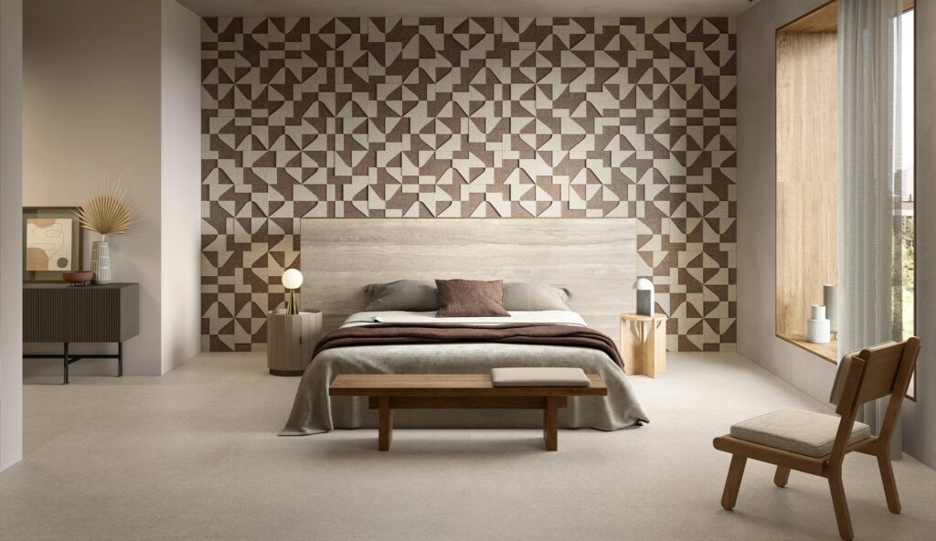 Compatta slab with various triangular shapes on wall behind bed