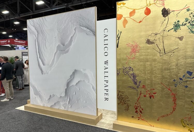 Calico Wallpaper display at HD Expo wiht one floral design and one that looks like a topographic map