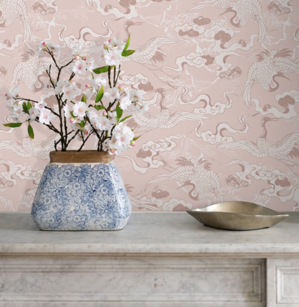 Japonisme collection of floating birdlike forms in white on a pink background