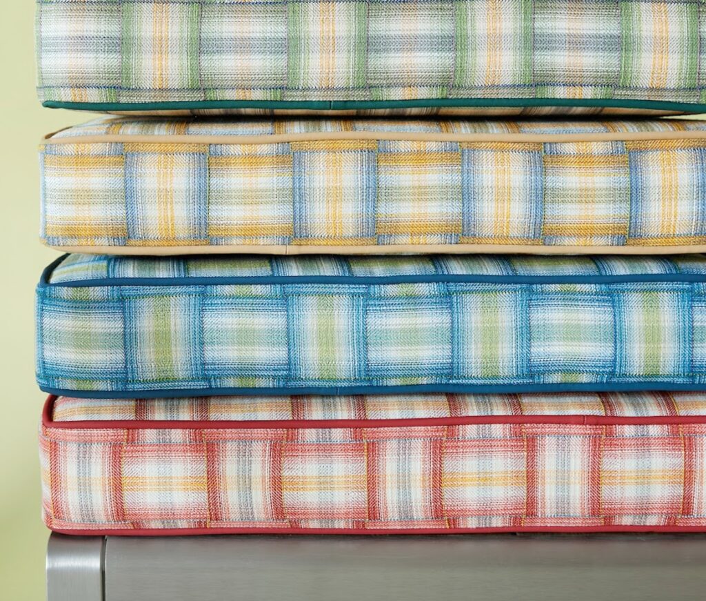 Lawn chair from Reunion collection on cushions in four colors.