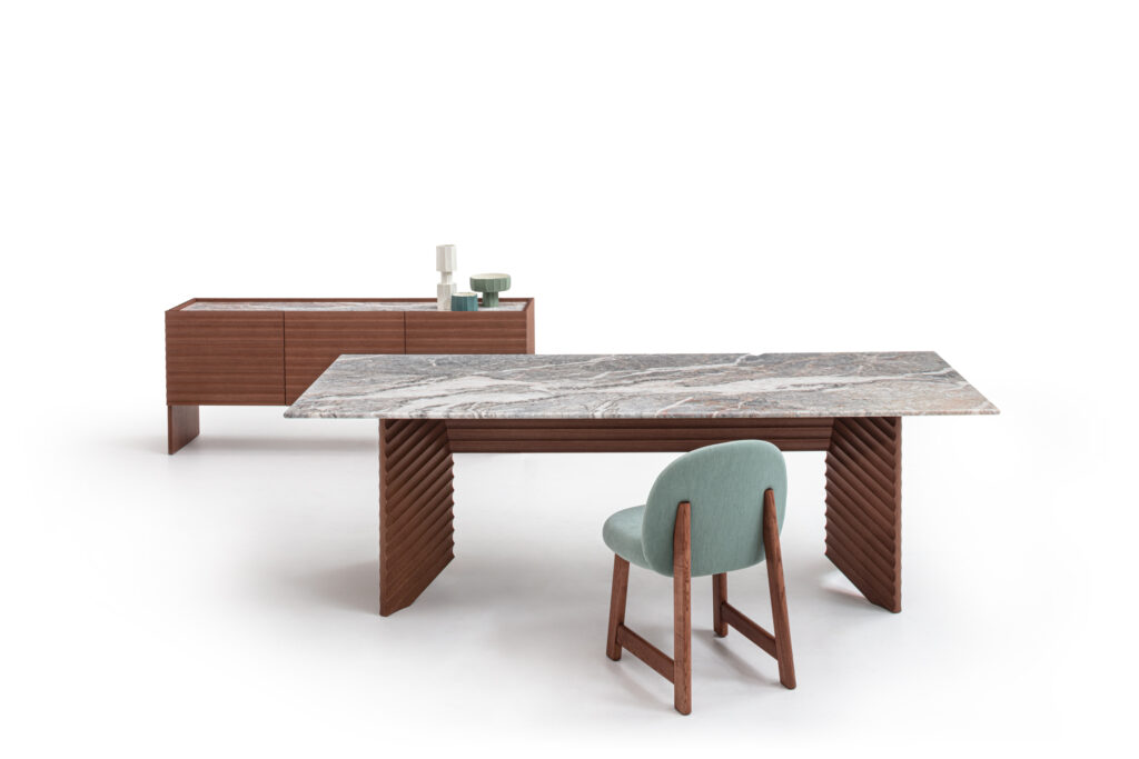 Rows table with marble top and console in background