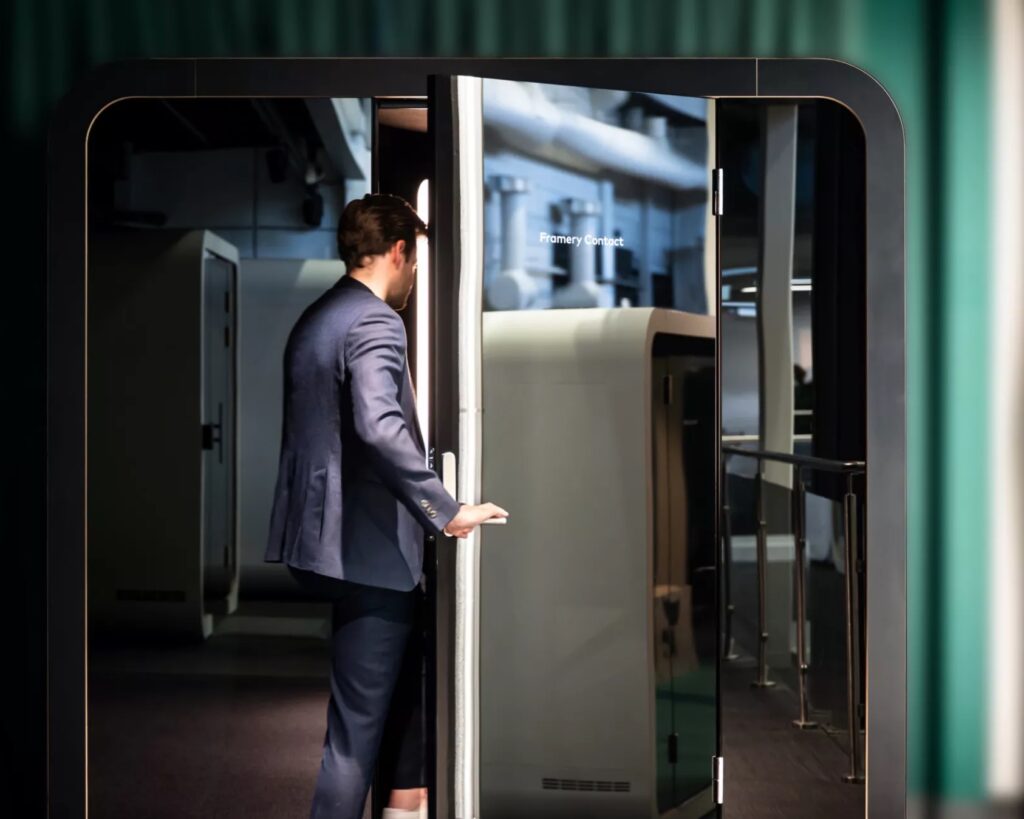 Man entering Framery video conference booth