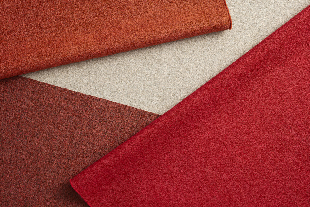 Desingtex Overtone textile in shades of red