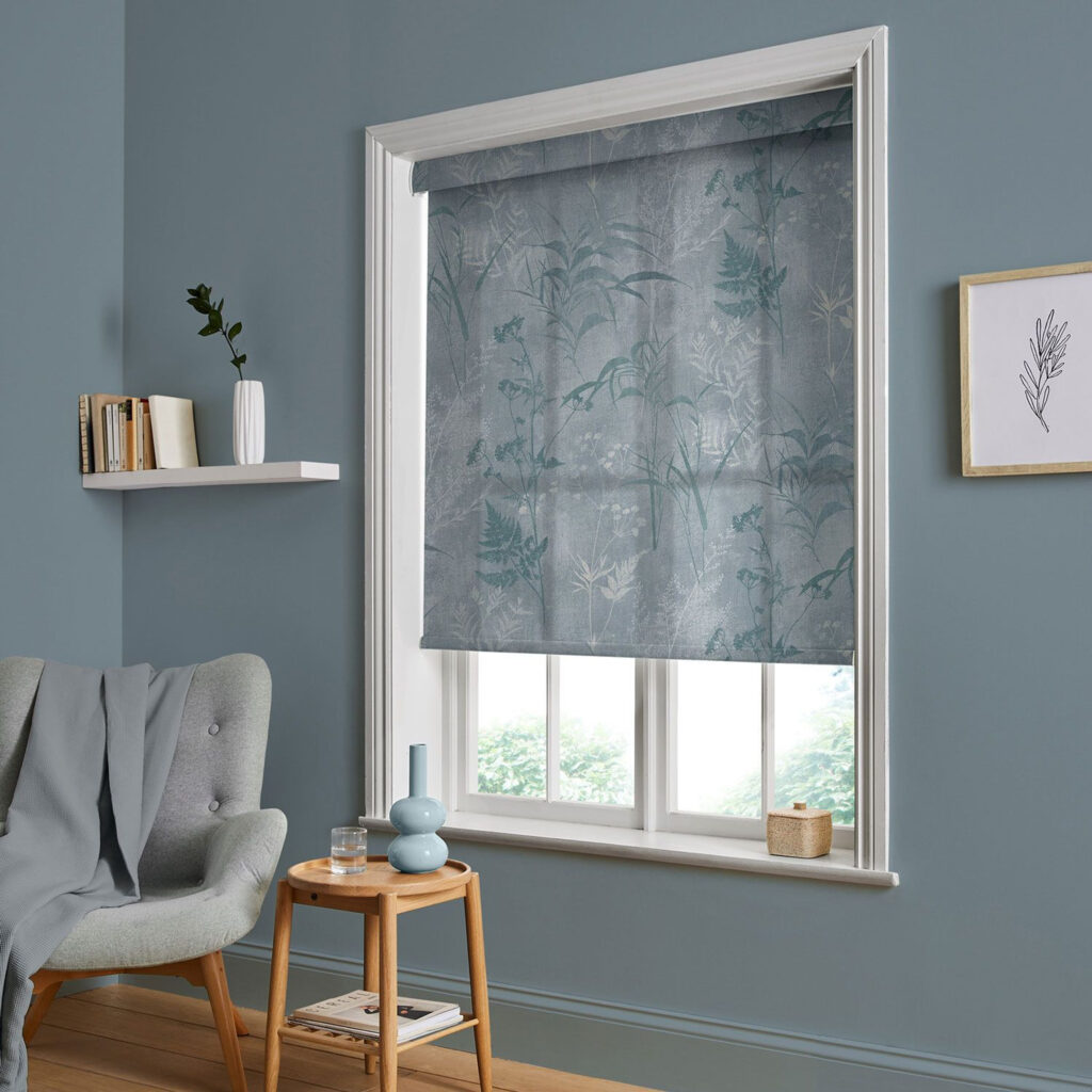 Restore fabric in a medium gray with thin trees and palm fronds