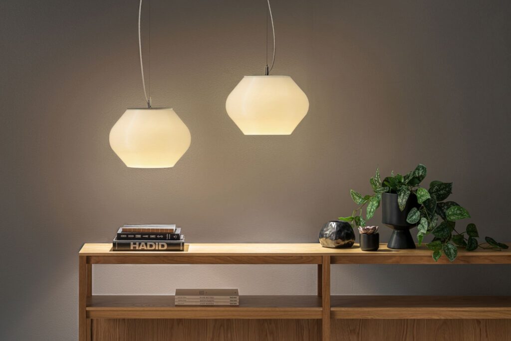 Sea Foam spherical pendant above credenza