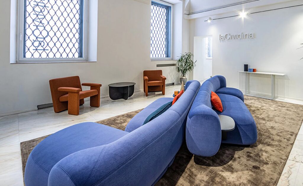 Dorothea in La Cividina showroom, in indigo blue