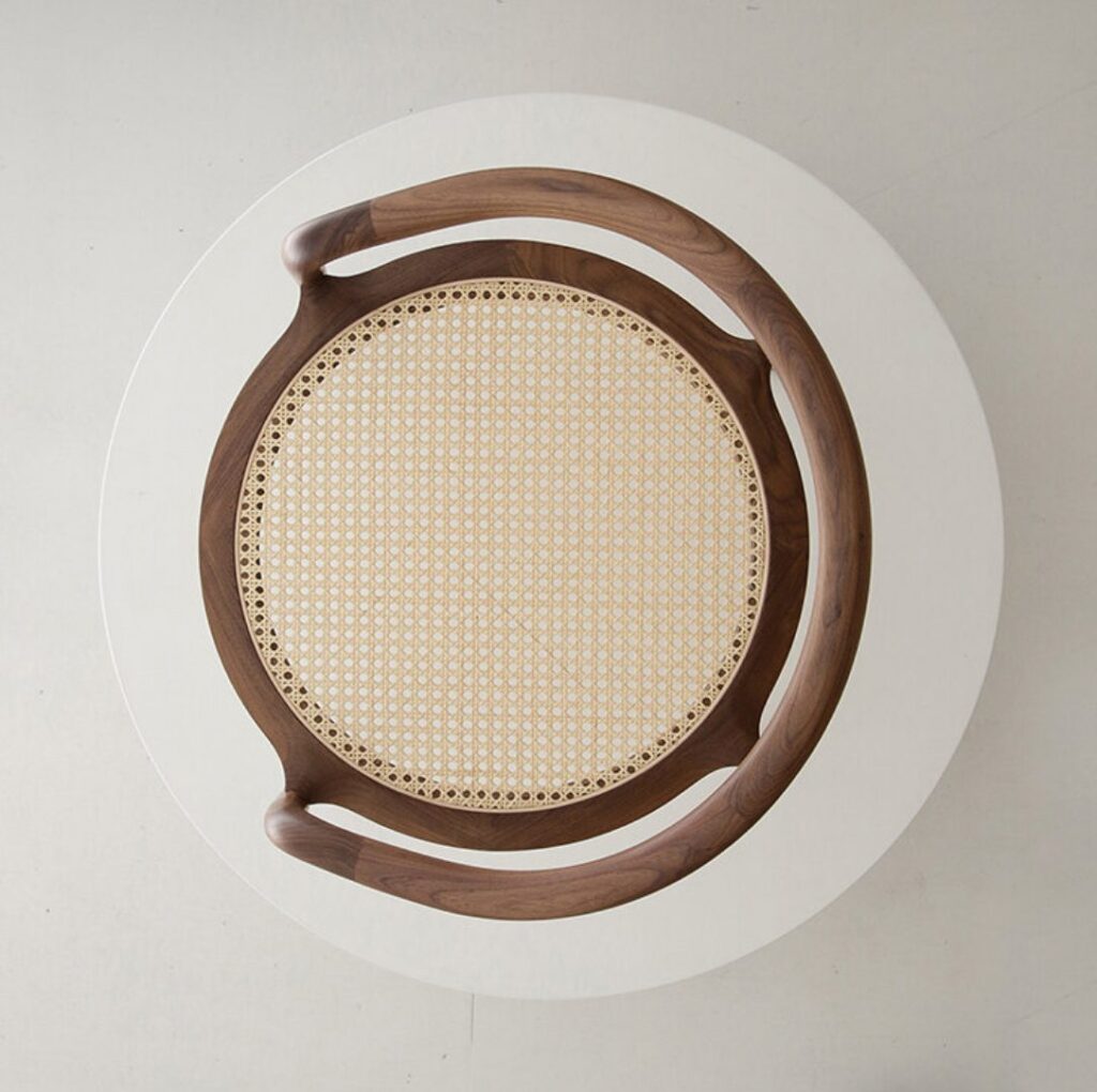 Chair viewed from above with view of rattan cane seat