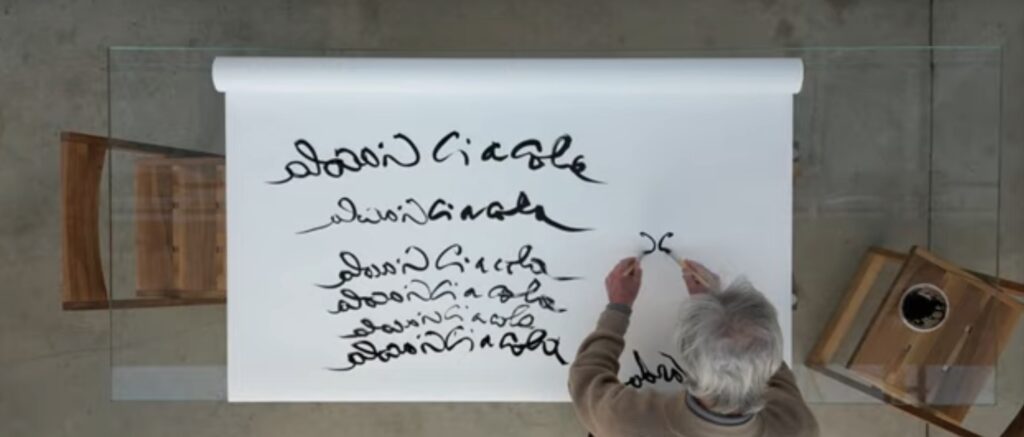 Ciàcola video of the designer writing the name