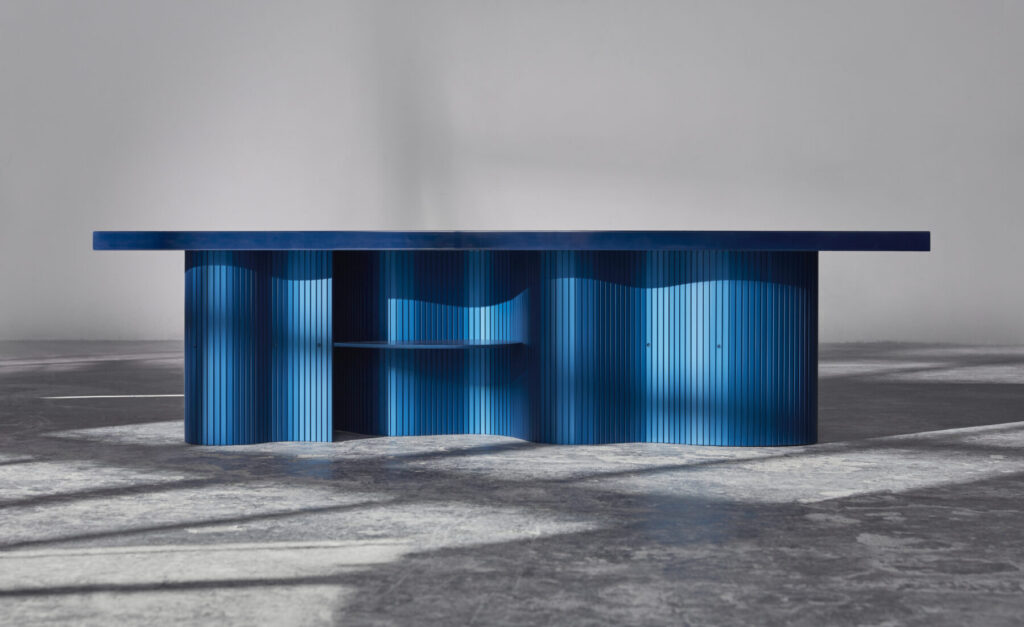 Blue table with aluminum base side view