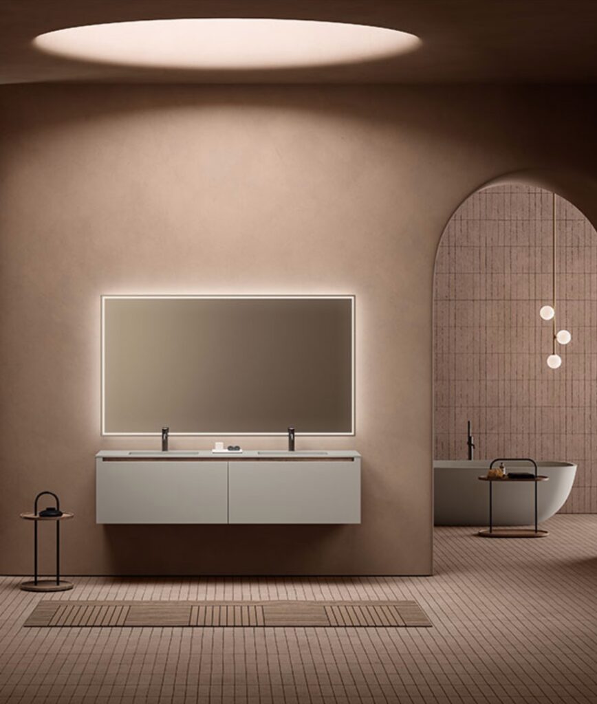 Strato white vanity with white slipper style tub in background