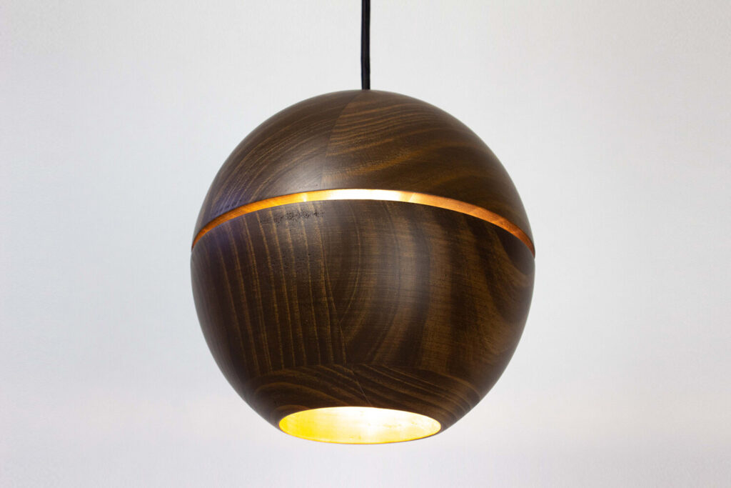 Close view of pendant lamp in dark walnut