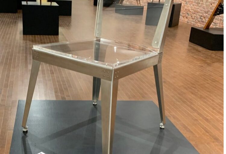 Acrylic chair on podium