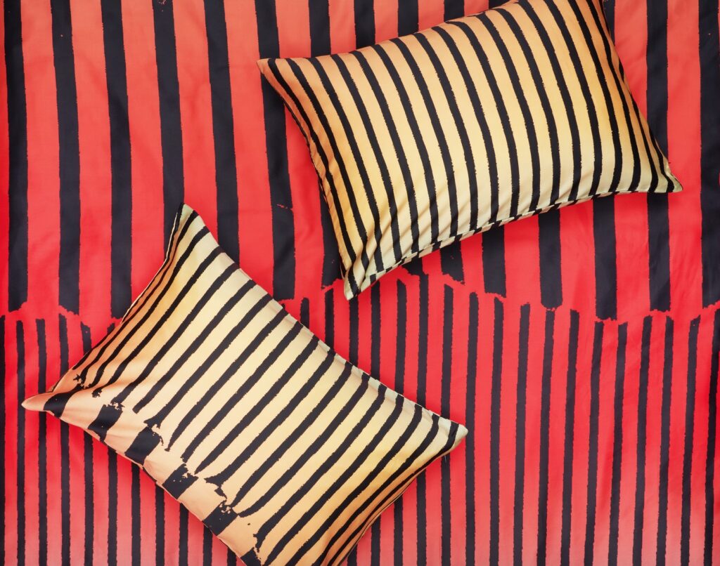 Summer Wave bedding in vibrant red and yellow