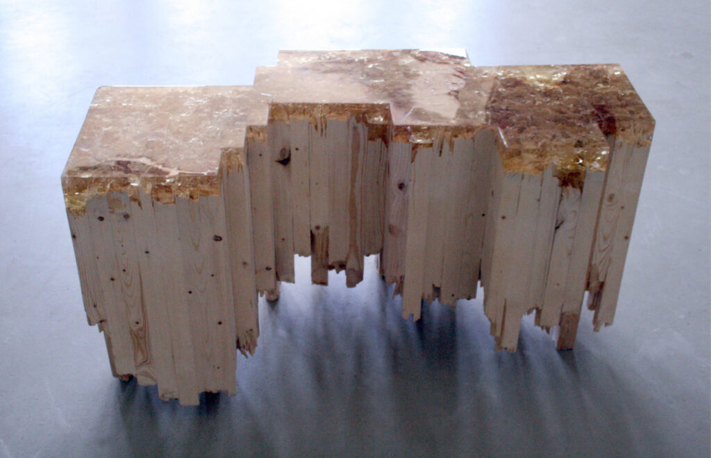 Table made of salvaged wood and resin